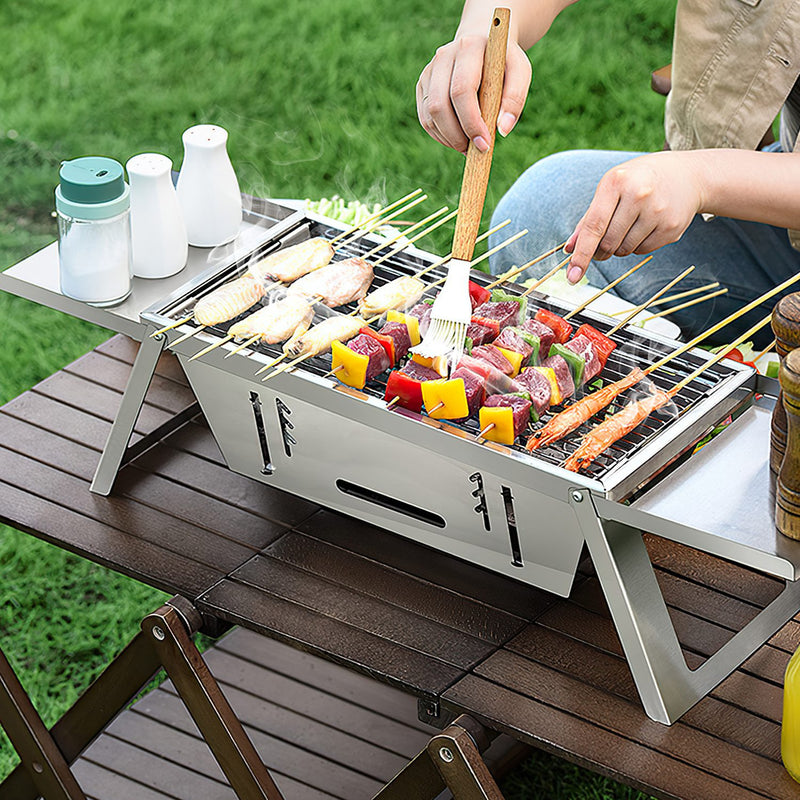 Multifunctional Camping Grill – Barbecue, Fire Pit, and Slow Cooker in Stainless Steel