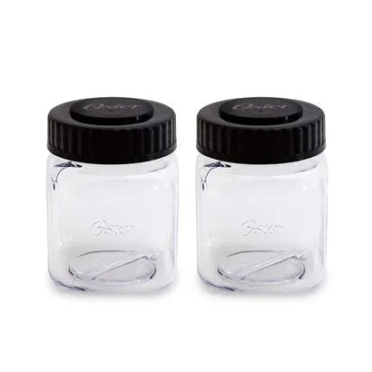 Dos mini jarras de 300 mL de la marca 0001 para uso en el hogar, en color transparente, con tapa y diseño compacto.