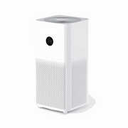 Purificador de aire Xiaomi Mi Air Purifier 3C en uso en un hogar, con filtro visible y diseño blanco compacto.
