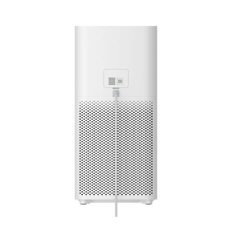 Purificador de aire Xiaomi Mi Air Purifier 3C en uso en un hogar, con filtro y panel de control visible.